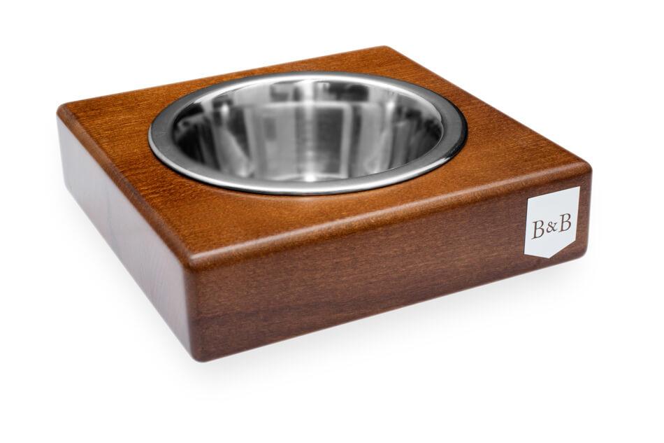 A dog bowl SOLO amber with the letter b on it by Bowlandbone.