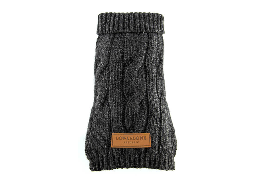 A dog sweater ASPEN graphite with a Bowl&Bone Republic label on it.