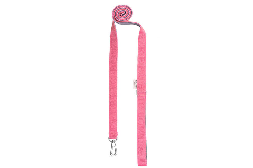 A dog leash BLOOM pink by Bowlandbone on a white background.