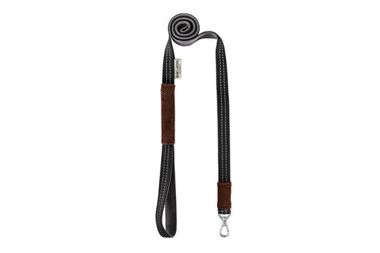 A Bowl&Bone Republic dog leash in CANDY brown with a black and brown leather strap.