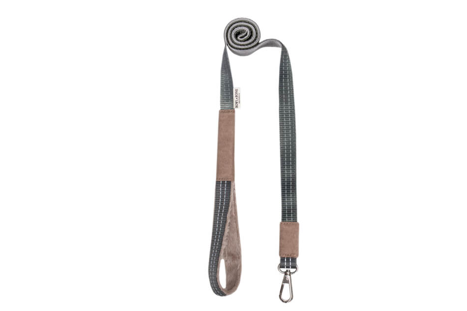 A Bowlandbone dog leash YETI brown with a grey and brown strap.