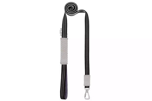 A black and white Bowl&Bone Republic dog leash SOHO cream with a silver buckle.