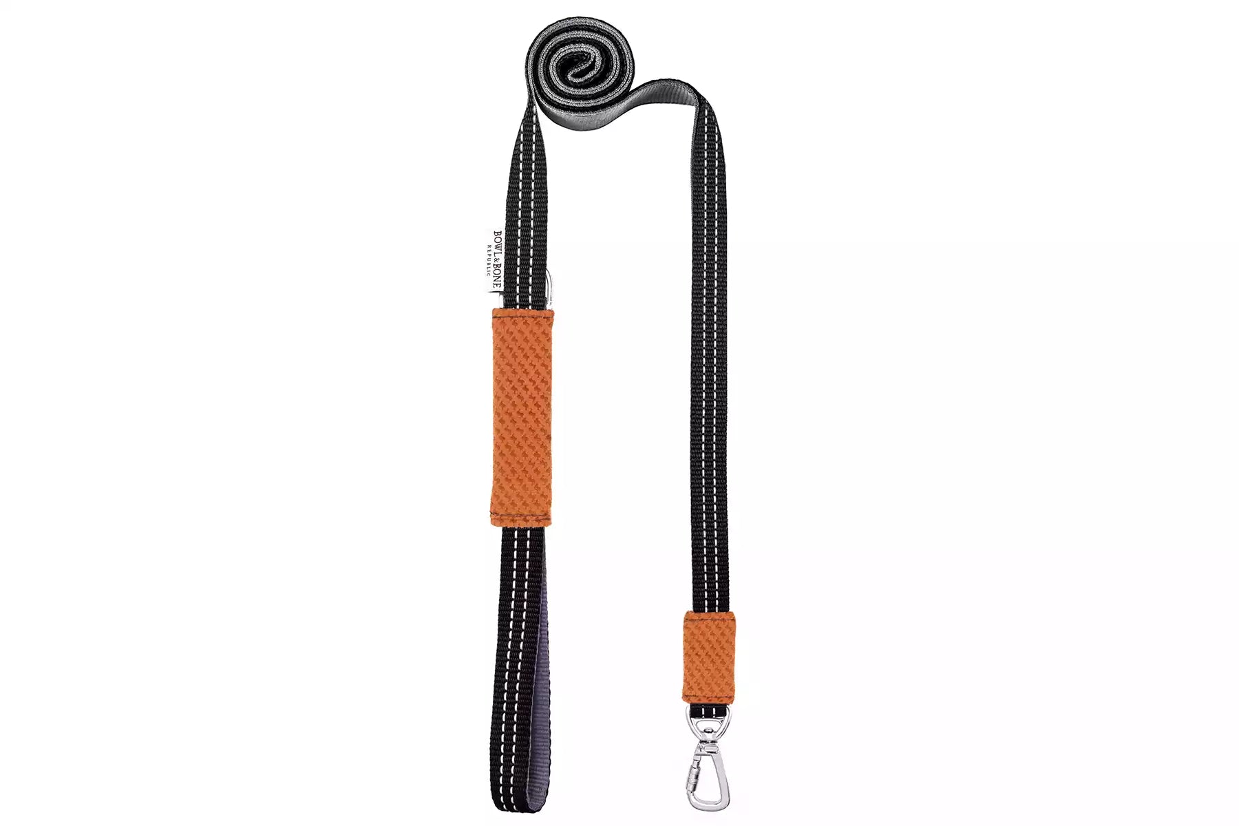 A SOHO orange dog leash with an orange and black handle from Bowl&Bone Republic.