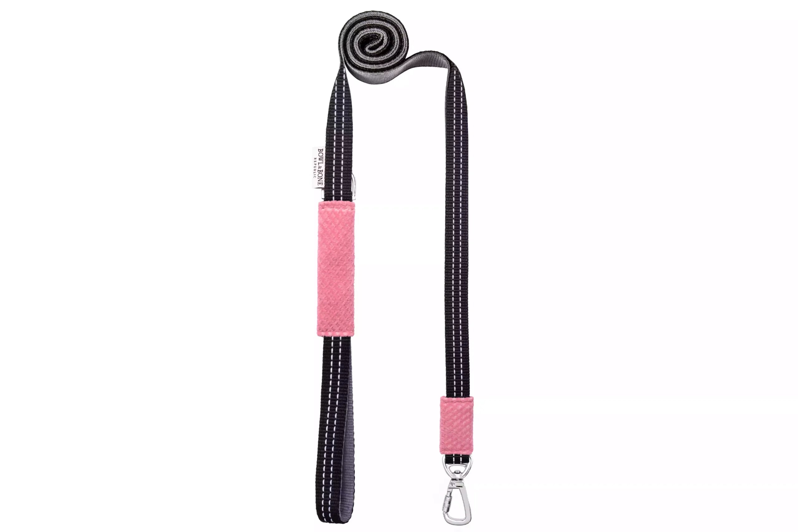 A pink and black dog leash made by Bowlandbone Republic.