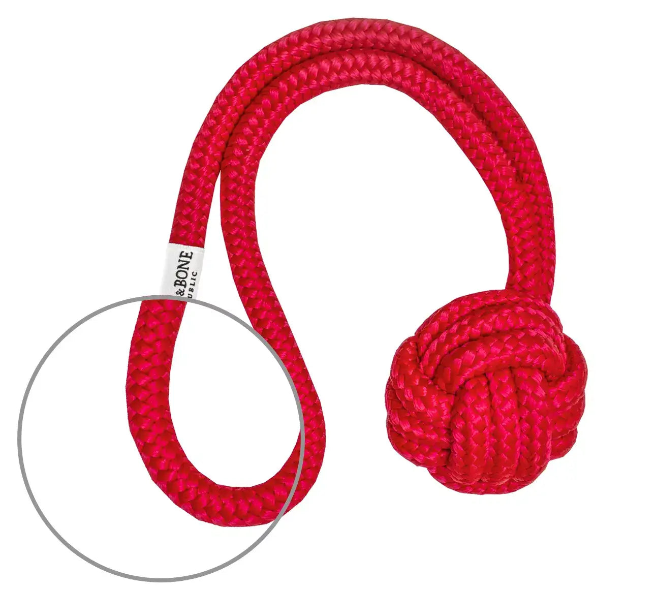 A Bowl&Bone Republic dog toy featuring a red rope and ball.