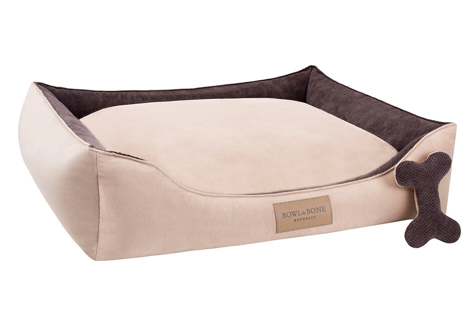 A Bowl&Bone Republic CLASSIC brown dog bed with a brown and beige design.