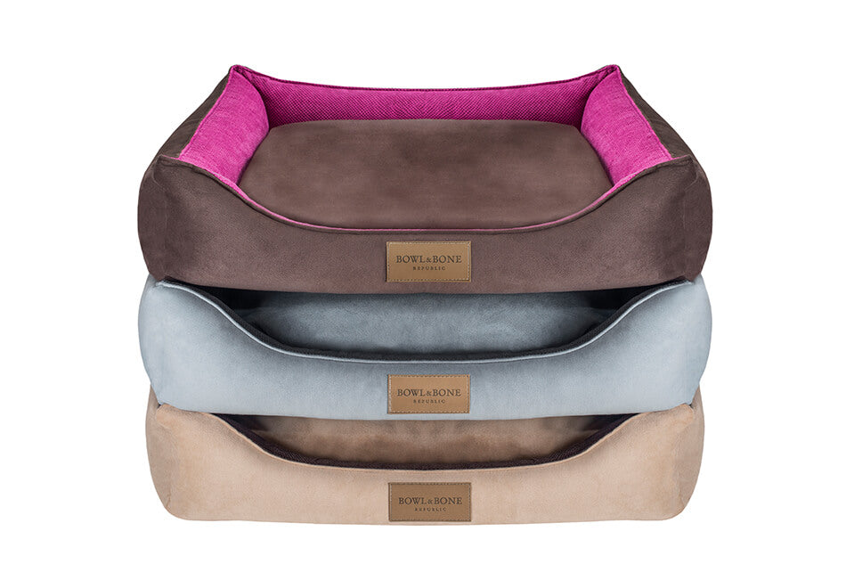 Three Bowl&Bone Republic dog bed CLASSIC brown stacked on top of each other.