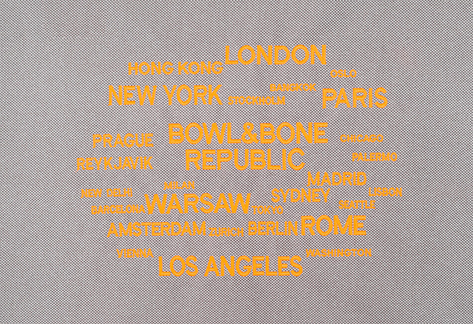 A Bowlandbone dog bed with the words london, COSMOPOLITAN Platinum.