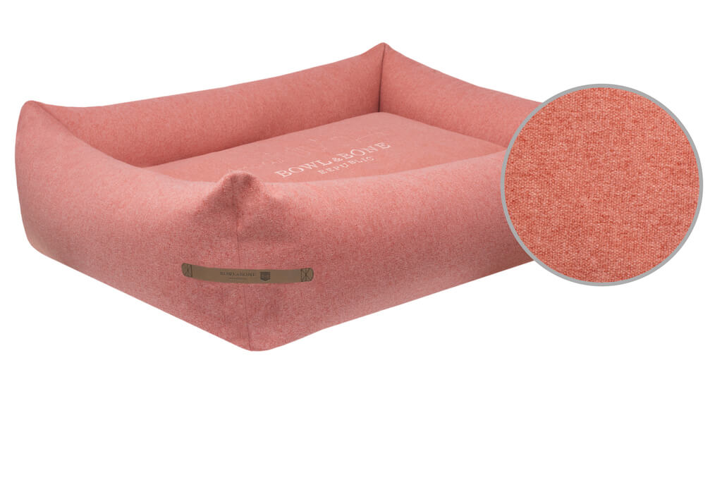 A pink dog bed manufactured by Bowl&Bone Republic.