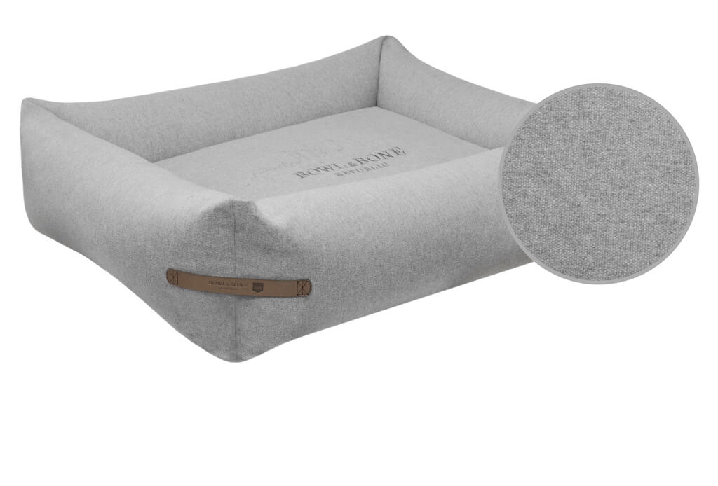 A Bowl&Bone Republic dog bed with a grey leather cover.