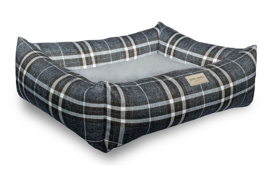 A dog bed by Bowl&Bone Republic with a blue plaid pattern.
