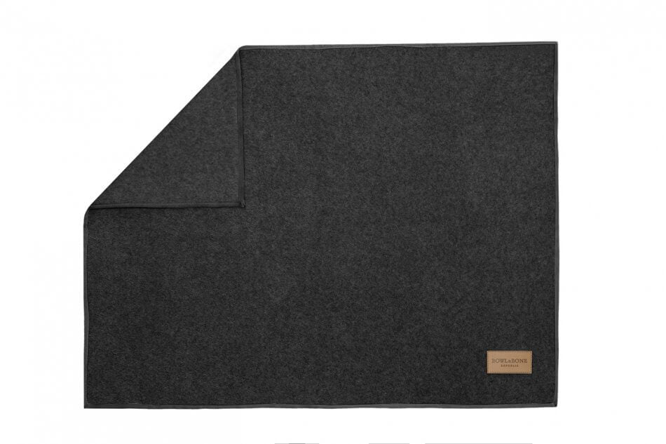 A Bowlandbone dog blanket with a brown patch, fit for Zen graphite pet beds.