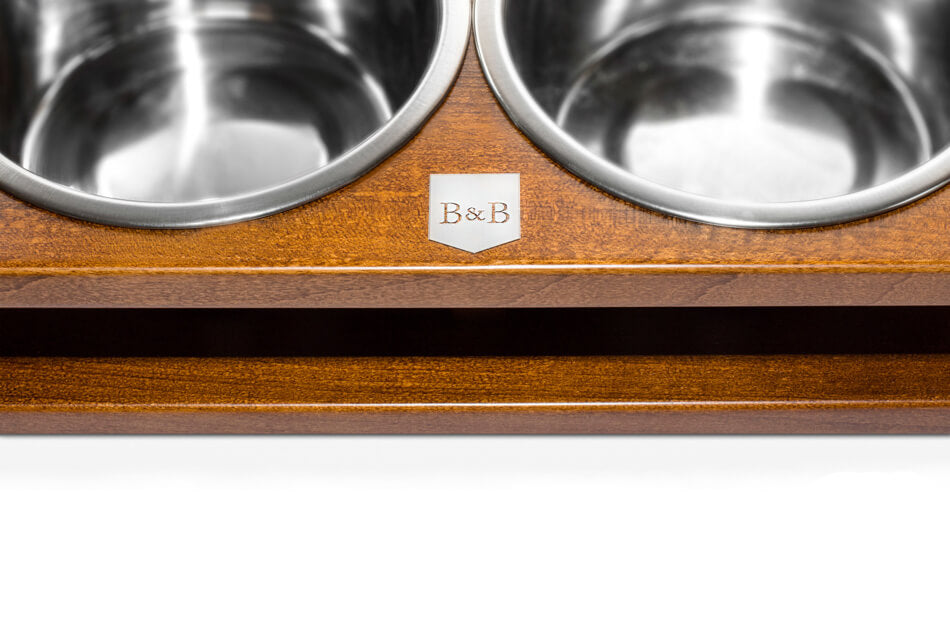 A Bowlandbone wooden dog bowl holder with three Bowlandbone dog bowl GRANDE amber bowls, created by Bowl&Bone Republic.