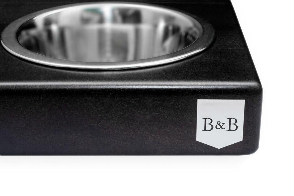 A black dog Bowl&Bone Republic bowl with the name Bowlandbone on it.