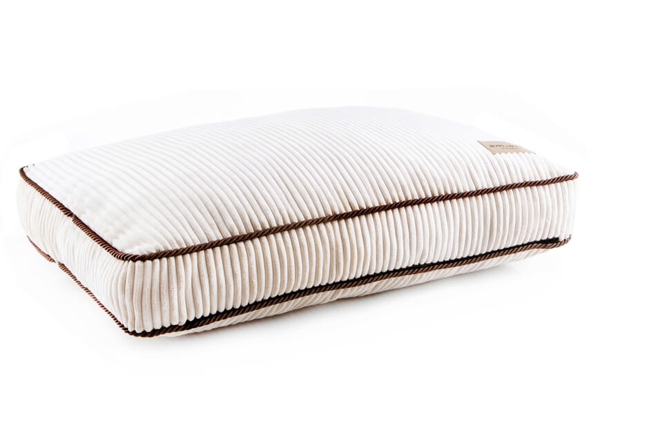 A Bowl&Bone Republic DECO amber dog cushion bed on a white background.