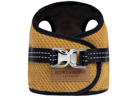 A yellow dog harness with a black buckle from Bowl&Bone Republic.