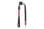 A CANDY pink dog harness and black leash with a black handle from Bowl&Bone Republic.