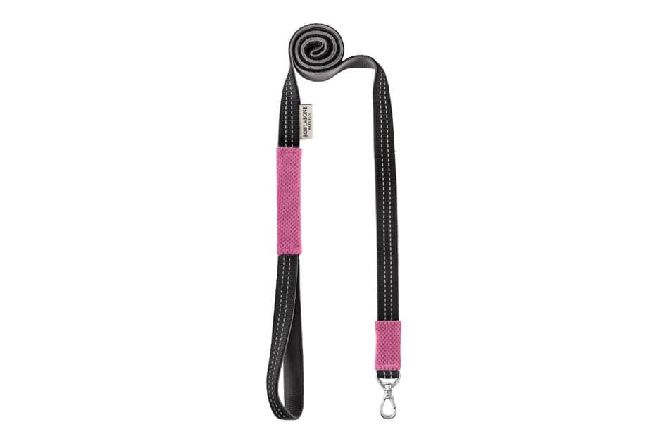 A CANDY pink dog harness and black leash with a black handle from Bowl&Bone Republic.