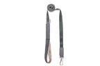 A dog harness with a handle attached to it from Bowl&Bone Republic in YETI grey.