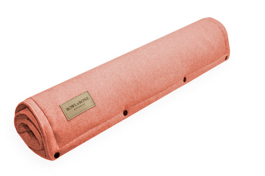 A roll of dog mat LOFT coral felt with a Bowl&Bone Republic label on it.