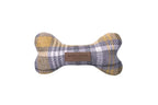 A yellow and grey plaid Bowl&Bone Republic dog toy BONE.