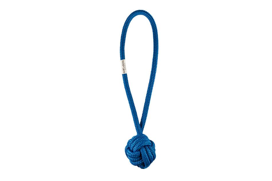 A blue dog toy with a knot on it by Bowlandbone Republic.