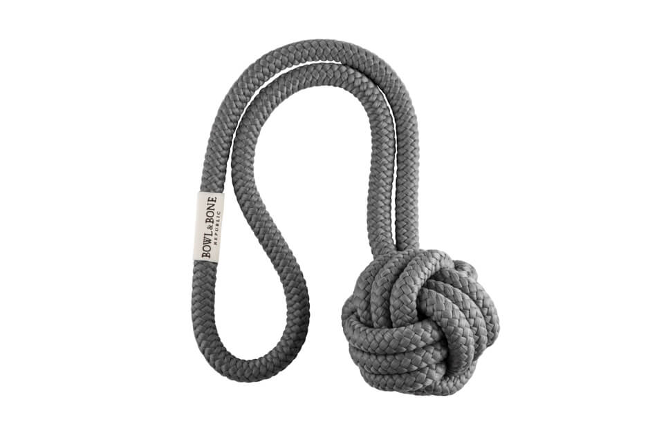 A grey dog toy with a knot on it from Bowl&Bone Republic.