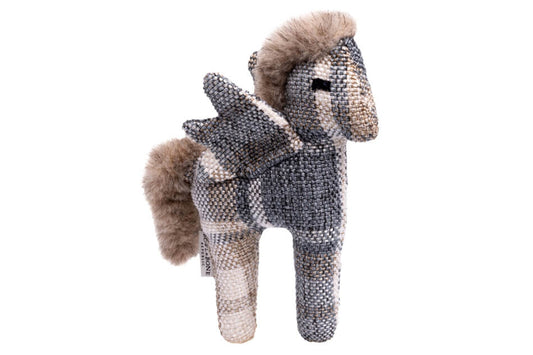 A grey and white dog toy PEGASUS stuffed animal with a furry tail from Bowlandbone Republic.