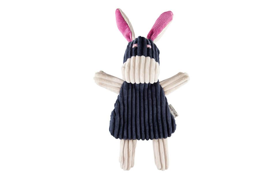 A Bowl&Bone Republic bunny plush toy with a pink dress.