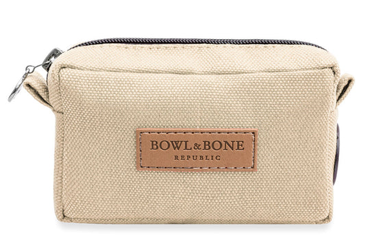 A Bowl&Bone Republic dog treat bag MIDI beige with the word Bowlandbone on it.