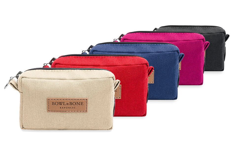 Four different colors of Bowlandbone dog treat bag from Bowl&Bone Republic with zippers.