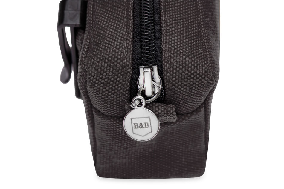 A Bowl&Bone Republic dog treat bag MIDI black with a silver zipper.
