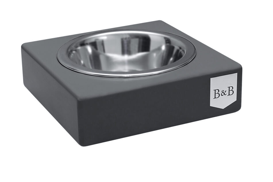 A dog bowl with the brand Bowlandbone on it, made of graphite.