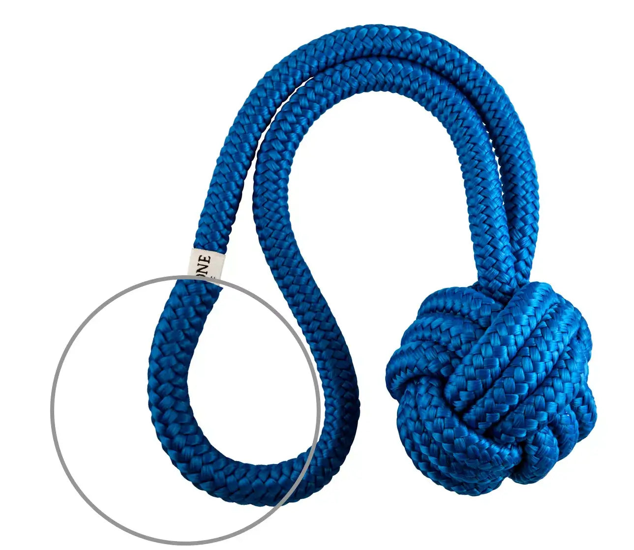 A Bowl&Bone Republic dog toy in BULLET blue with a circle in the middle.